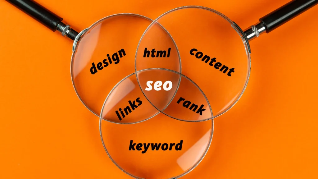 Magnifying glasses with SEO-related terms highlighting design, content, and keywords, essential for finding your SEO baseline.